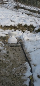 The rain gauge is positioned on the bank of the Mound